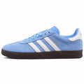 Adidas Gazelle azul cielo blanco lateral izquierda suela marrón