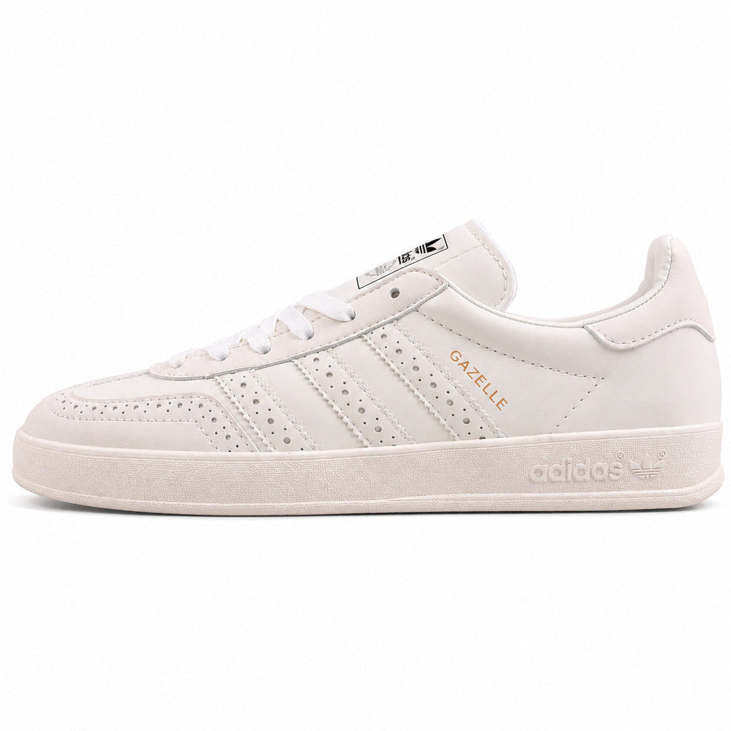 Adidas Gazelle Indoor triple blanco cuero perforado lateral izquierda