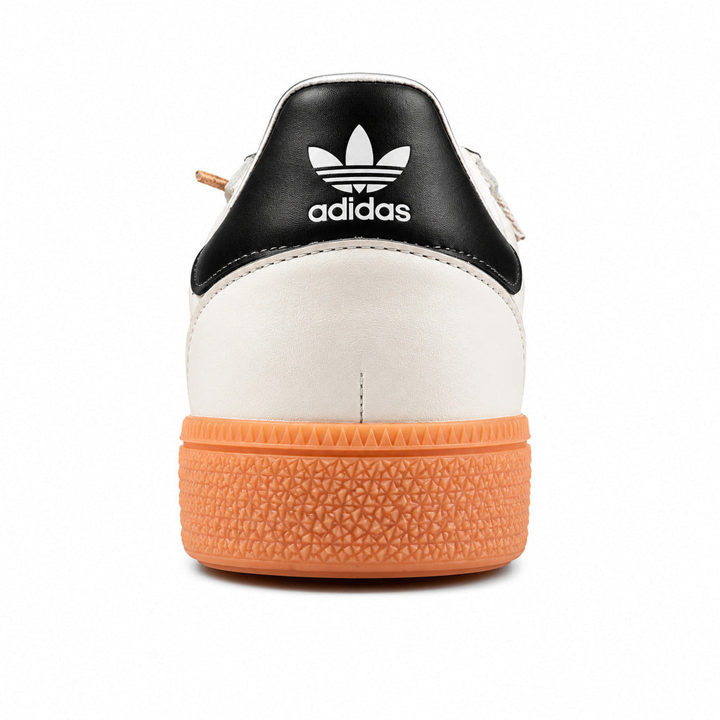 Adidas Handball Spezial crema negro suela naranja detalle contrafuerte trasero