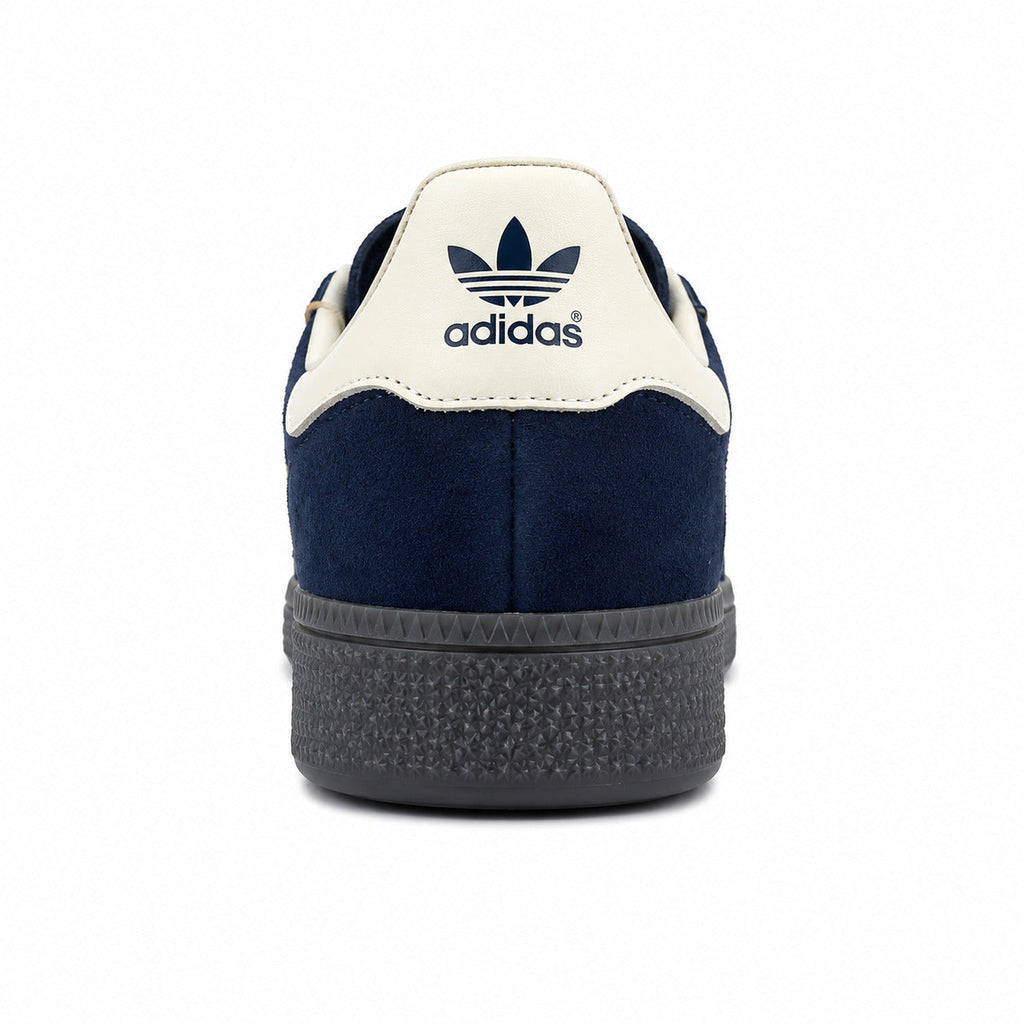 Adidas Handball Spezial azul marino crema detalle talón logo trefoil