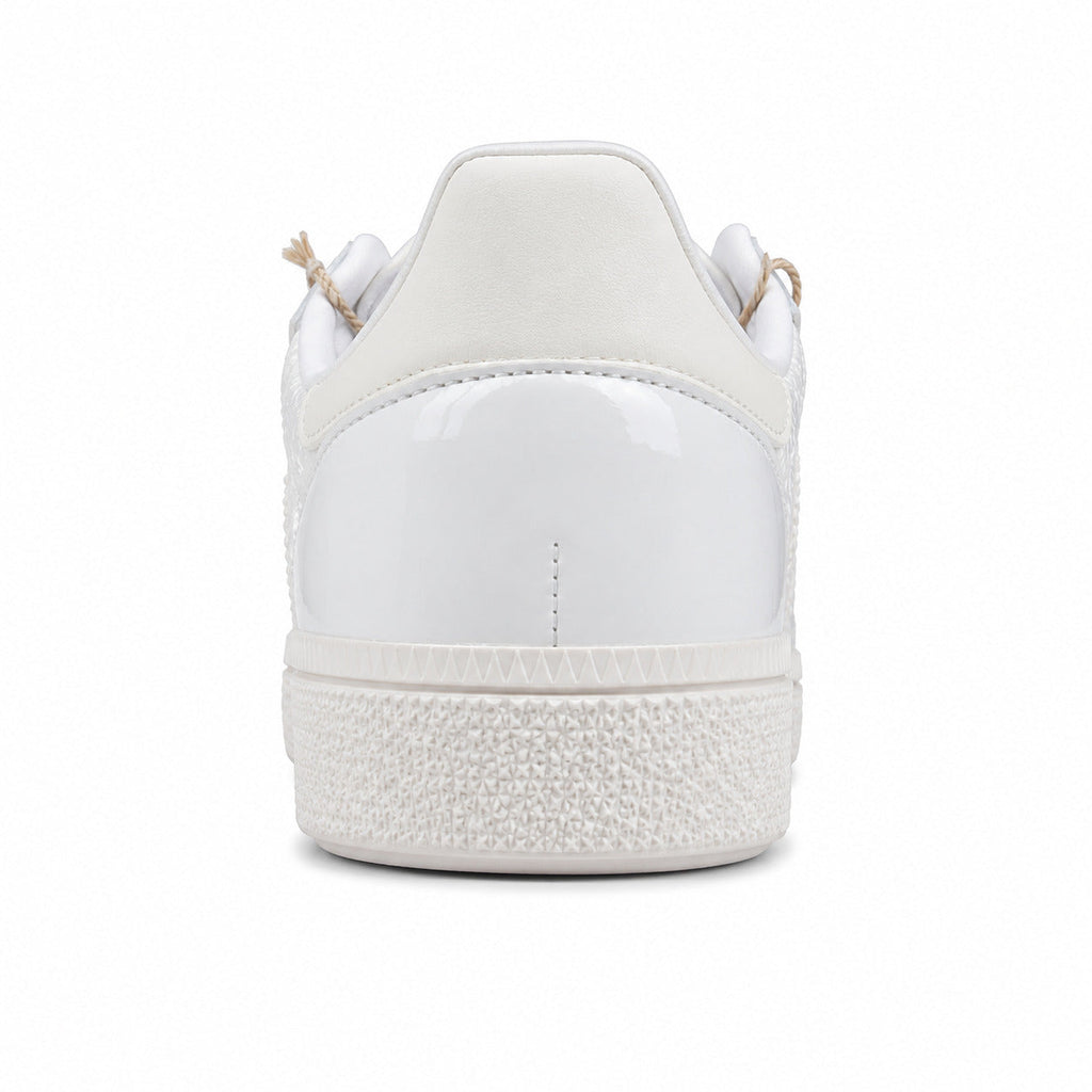 Adidas Handball Spezial plateado crema detalle talón suela blanca