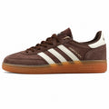 Adidas Handball Spezial x Sporty Rich marrón ante bandas crema logo dorado suela goma perfil izquierdo