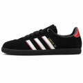 Adidas London 96 negro ante, franjas blancas y rojas, lateral exterior
