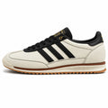 Adidas SL 72 RS crema cuero bandas negro dorado suela goma perfil izquierdo