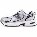 New Balance 530 blanco negro plata vista lateral izquierda
