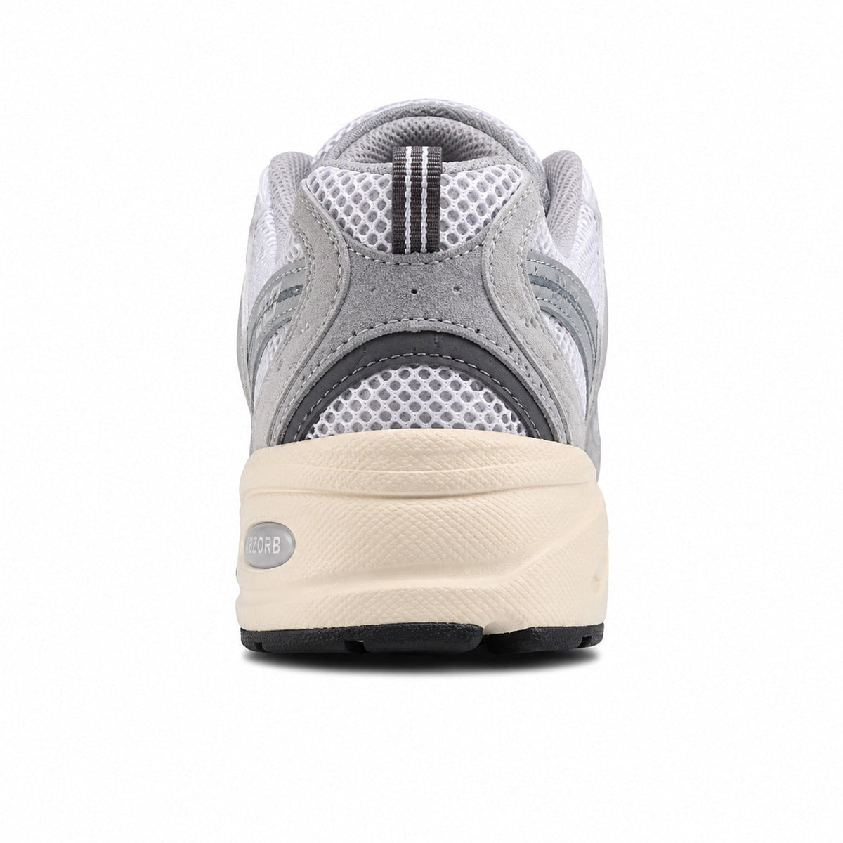 New Balance 530 gris crema detalle talón suela crema
