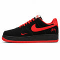 Nike Air Force 1 Low x Stussy negro rojo ante lateral izquierdo