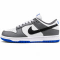 Nike Dunk Low blanco gris negro azul royal lateral izquierda