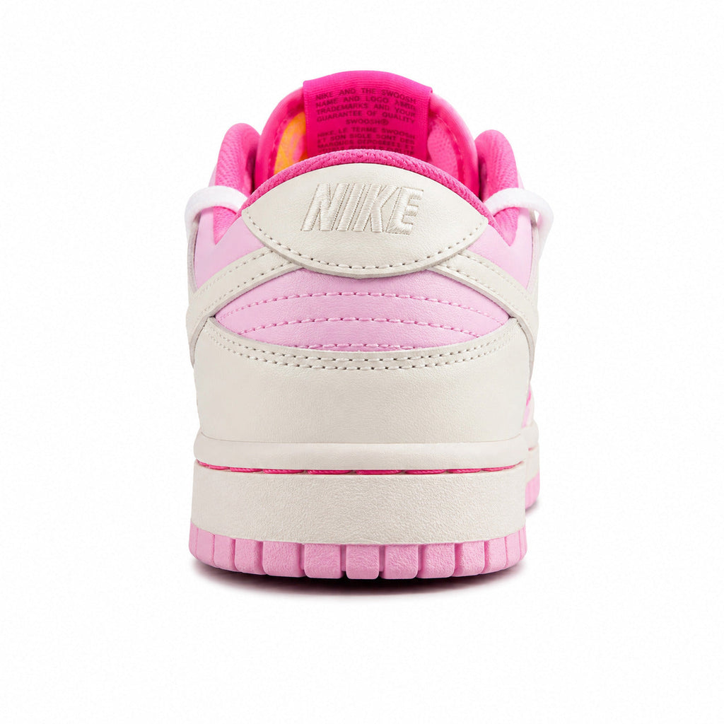 Nike Dunk Low crema rosa pastel fucsia detalle talón