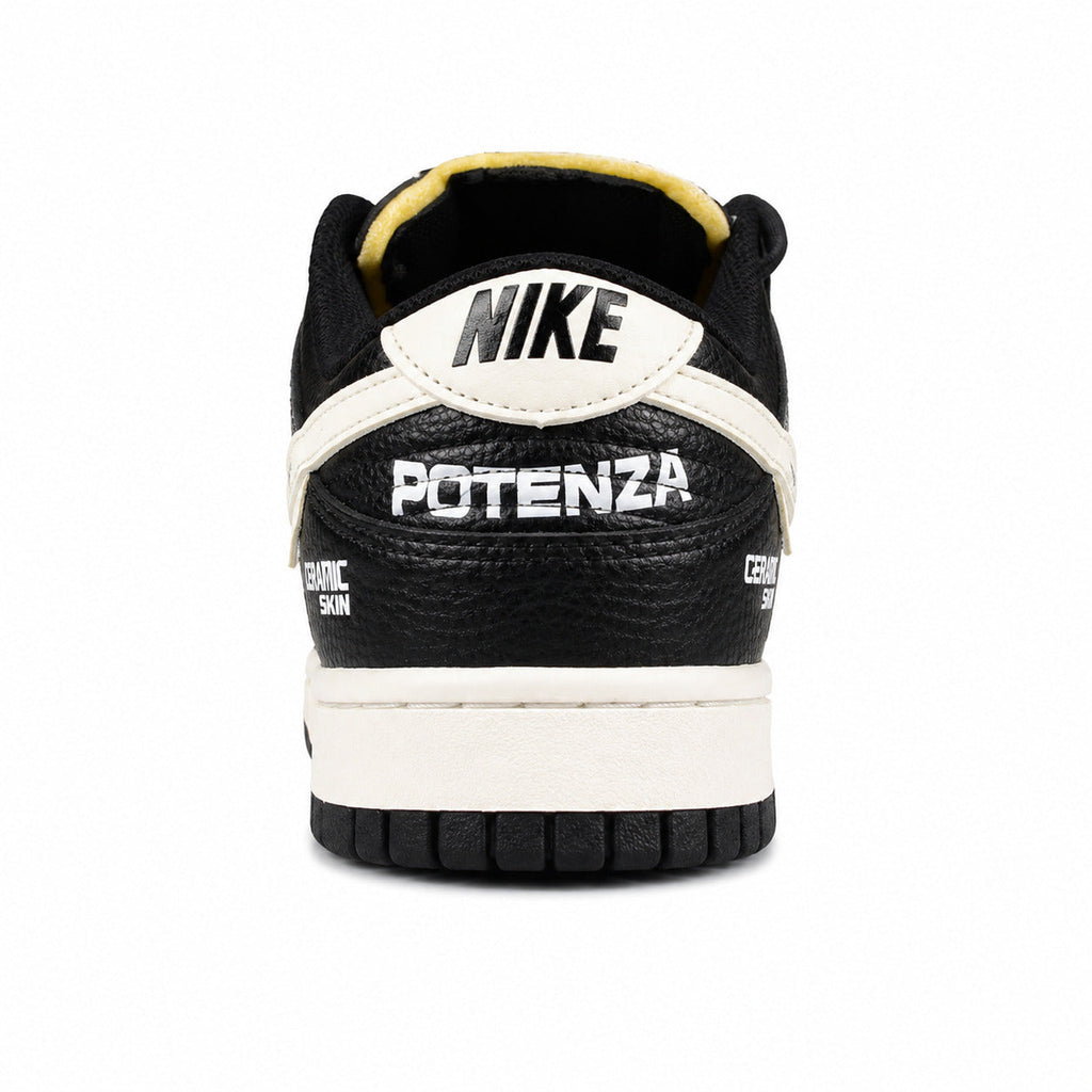 Nike Dunk Low x Calsonic Nissan Impul negro crema detalle talón